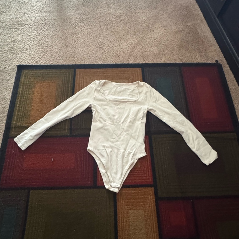 Elegant Cream Long Sleeve Bodysuit